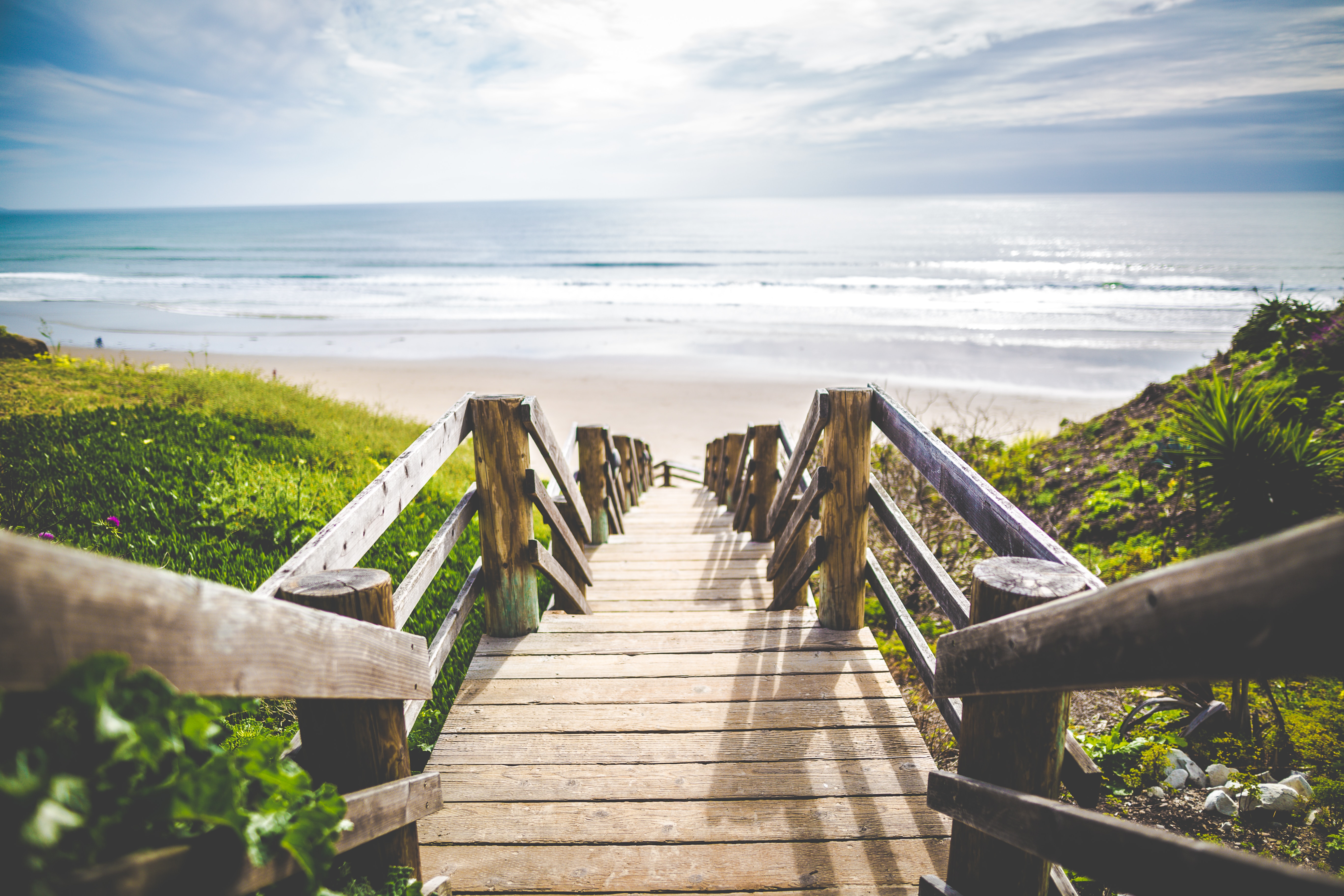 Soothing image of a bridge leading to a beach